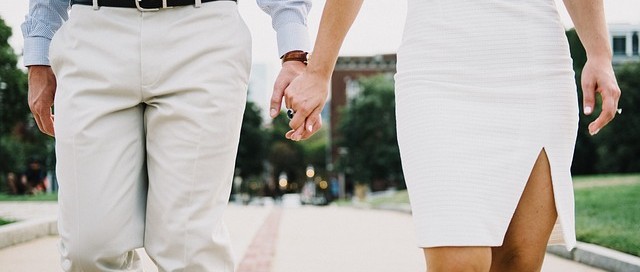 couple holding hands saving tax