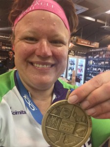 Rachel with Gold Medal after community bike ride