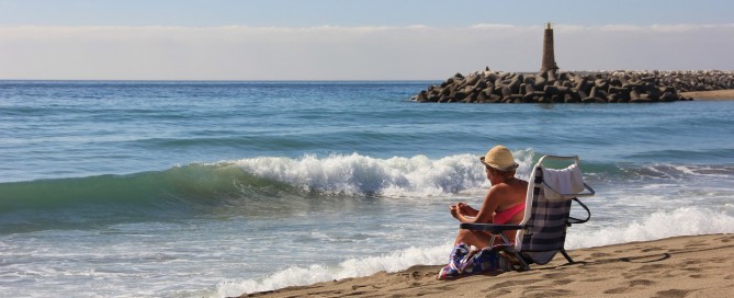 Woman on the beach in retirement