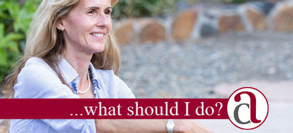 woman considering if she should be taking an income from my pensions